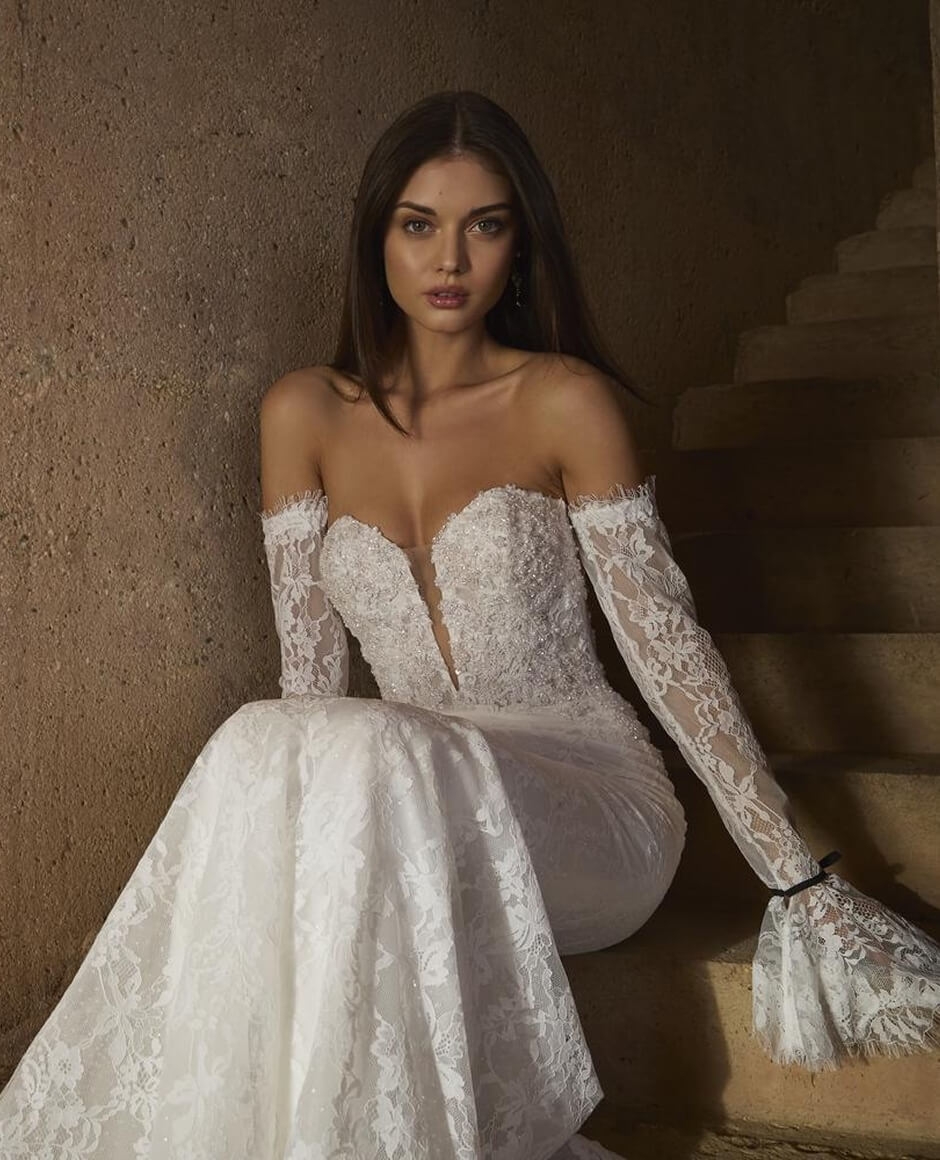 Model wearing a white dress